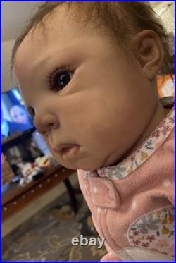 25 inch toddler reborn baby doll brown rooted hair and brown eyes