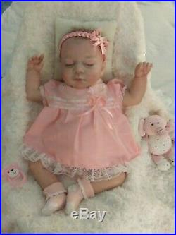 Beautiful Reborn Baby Doll 18 Vinyl head, arms and legs. Soft doe suade body