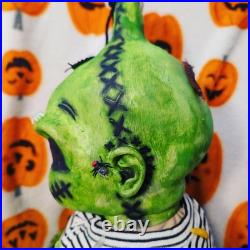 Green Vinyl Baby Doll Black Eyes Halloween Gothic & Horror Oogie Boogie Bugs