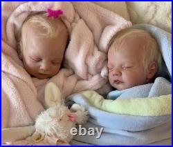 Hand made authentic reborn twin dolls