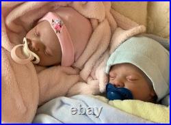 Hand made authentic reborn twin dolls