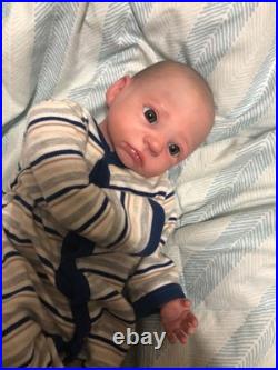 Hand painted vinyl reborn baby boy in perfect condition