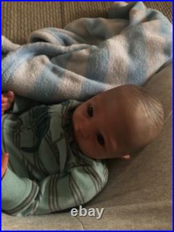 Hand painted vinyl reborn baby boy in perfect condition
