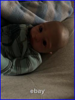 Hand painted vinyl reborn baby boy in perfect condition Hand painted vinyl reborn baby boy in perfect condition