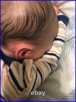 Hand painted vinyl reborn baby boy in perfect condition