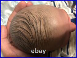 Hand painted vinyl reborn baby boy in perfect condition