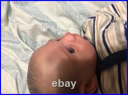 Hand painted vinyl reborn baby boy in perfect condition