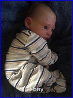 Hand painted vinyl reborn baby boy in perfect condition