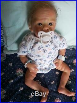 Reborn 18 baby boy doll by Laura Tuzio Ross with certificate