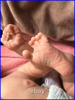 Reborn Baby, rooted hair, newborn, 4/4 arms and legs, upper torso detail