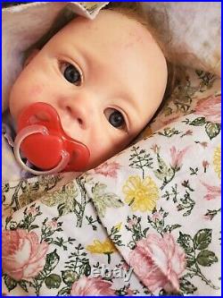 Reborn Vinyl and Cloth Weighted Baby Doll marked Elisa Marx 4 on neck 18