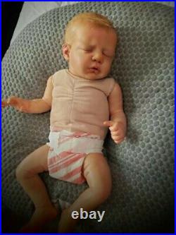 Reborn baby. Extremely realistic. Vinyl head and limbs, cloth body. Ll