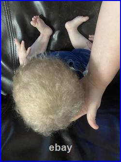 Reborn grant 23 inches with blonde hair and green eyes