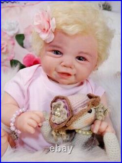 Regina's baby reborn doll Vivienne Faber it is a GIRL 20' HUMAN hair