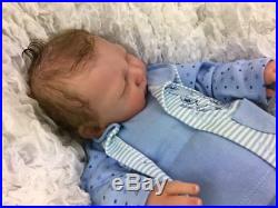 Stunning Reborn Baby Boy Doll Real Hand Rooted Hair Liam Silicone Feel