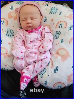 Vinyl cuddle reborn baby doll pre owned