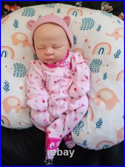 Vinyl cuddle reborn baby doll pre owned