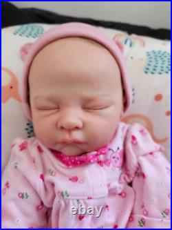 Vinyl cuddle reborn baby doll pre owned