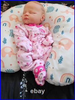 Vinyl cuddle reborn baby doll pre owned