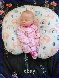 Vinyl cuddle reborn baby doll pre owned