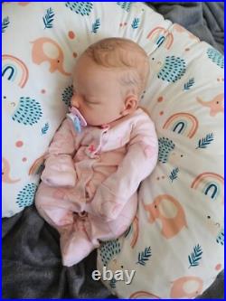 Vinyl cuddle reborn baby doll pre owned