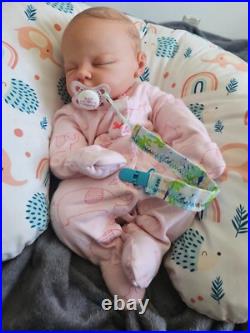 Vinyl cuddle reborn baby doll pre owned